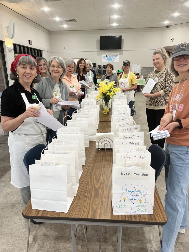 Stuffing letter bags for men in white.